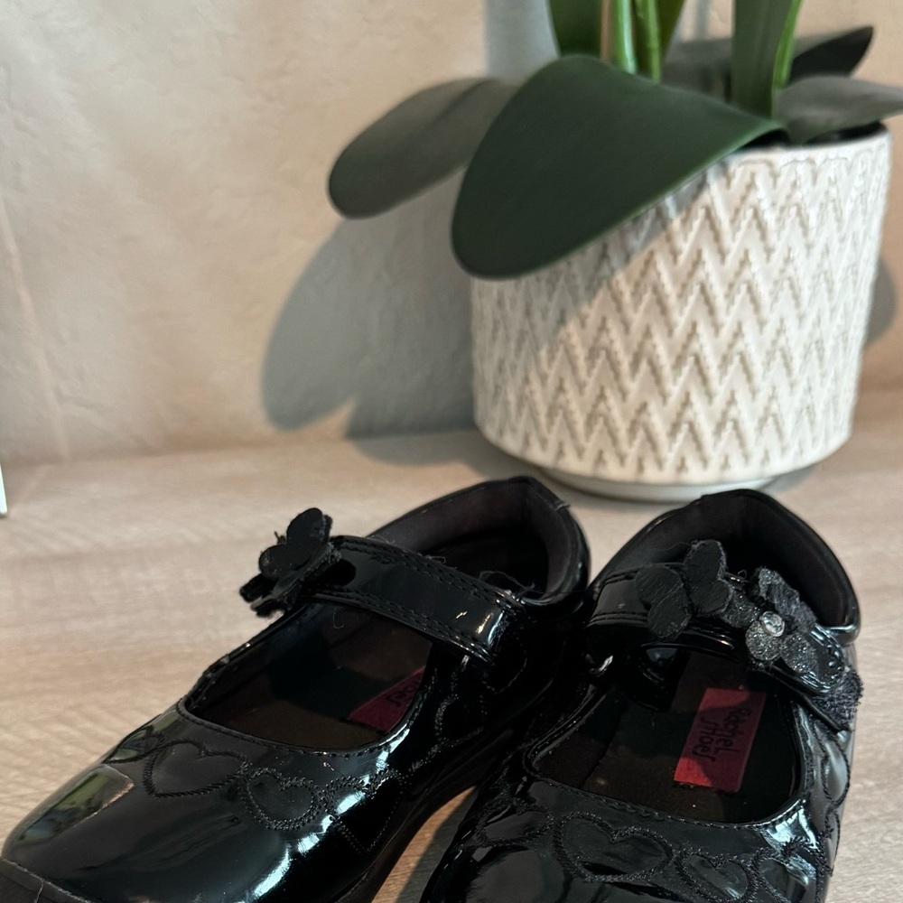 Rachel Shoes Black Patent Mary Janes with Heart & Flower Accents